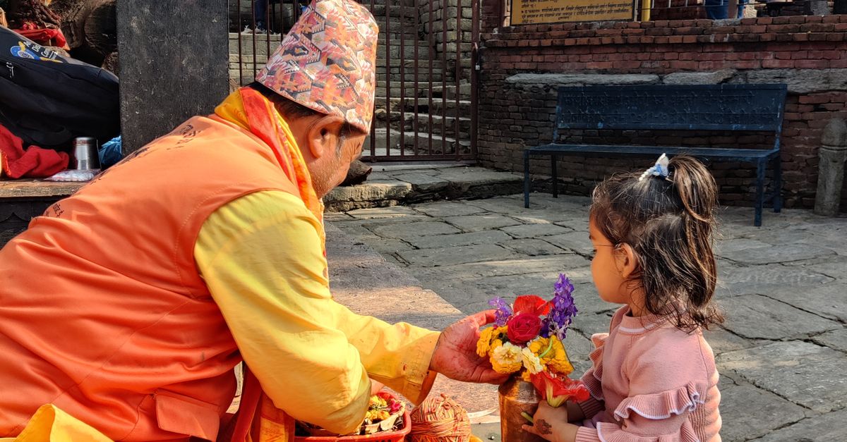Children Engaging In Ritual Child Participating in Traditional Ceremony · Free Stock Photo