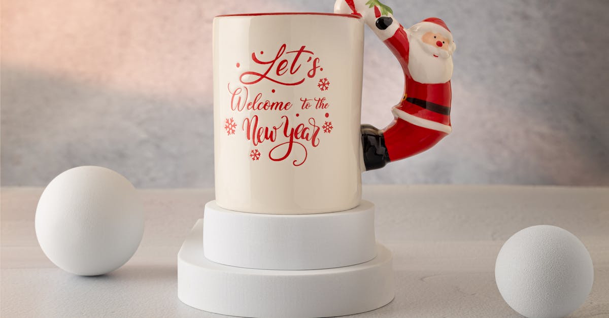 Decorative mug featuring Santa Claus handle welcomes the New Year. Perfect for holiday season festivities.