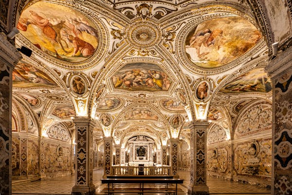 Ornate church interior with detailed frescoes