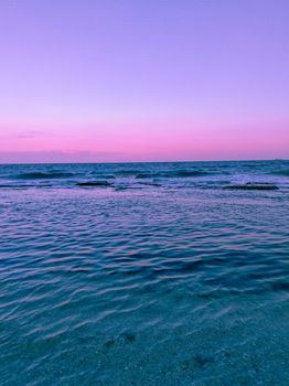 A tranquil pink sunset paints the sky over the Tekirdağ sea, capturing the essence of Turkish coastal beauty.