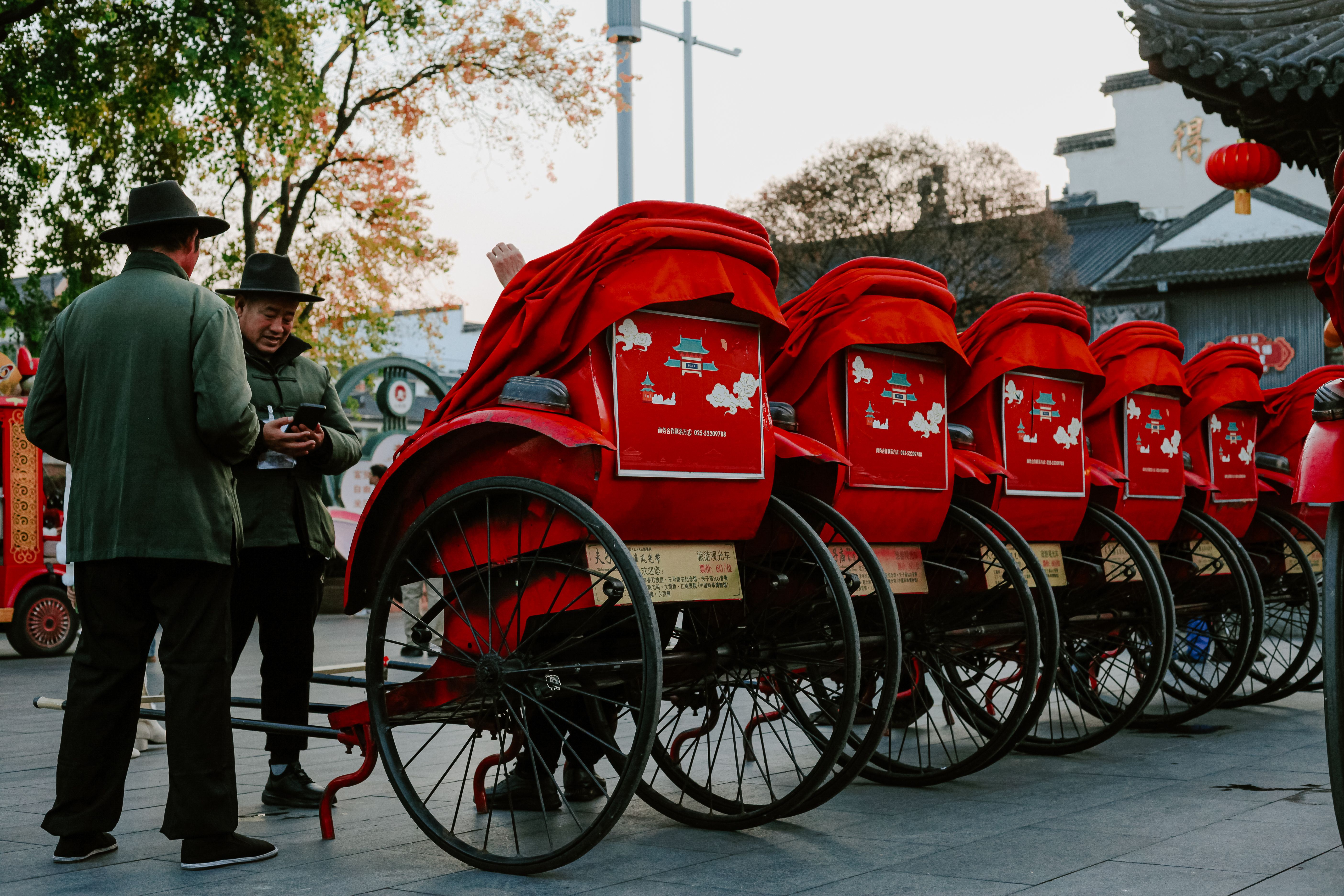 Charming Rickshaw Scene in Nanjing Street · Free Stock Photo