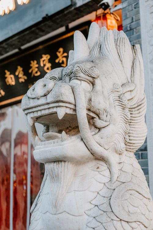 Free Close-up of a traditional Chinese stone guardian lion statue in Nanjing showcasing cultural heritage. Stock Photo