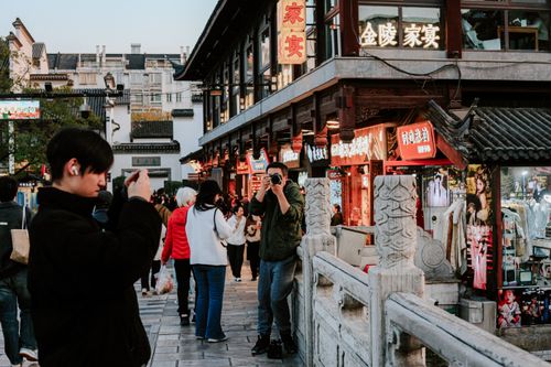 Free Capture of daily life in Nanjing's traditional shopping district, showcasing vibrant culture and architecture. Stock Photo