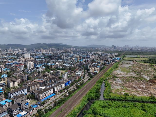 Photo: Rajkumarrr Comics Mumbai's skyline and railway lines from above