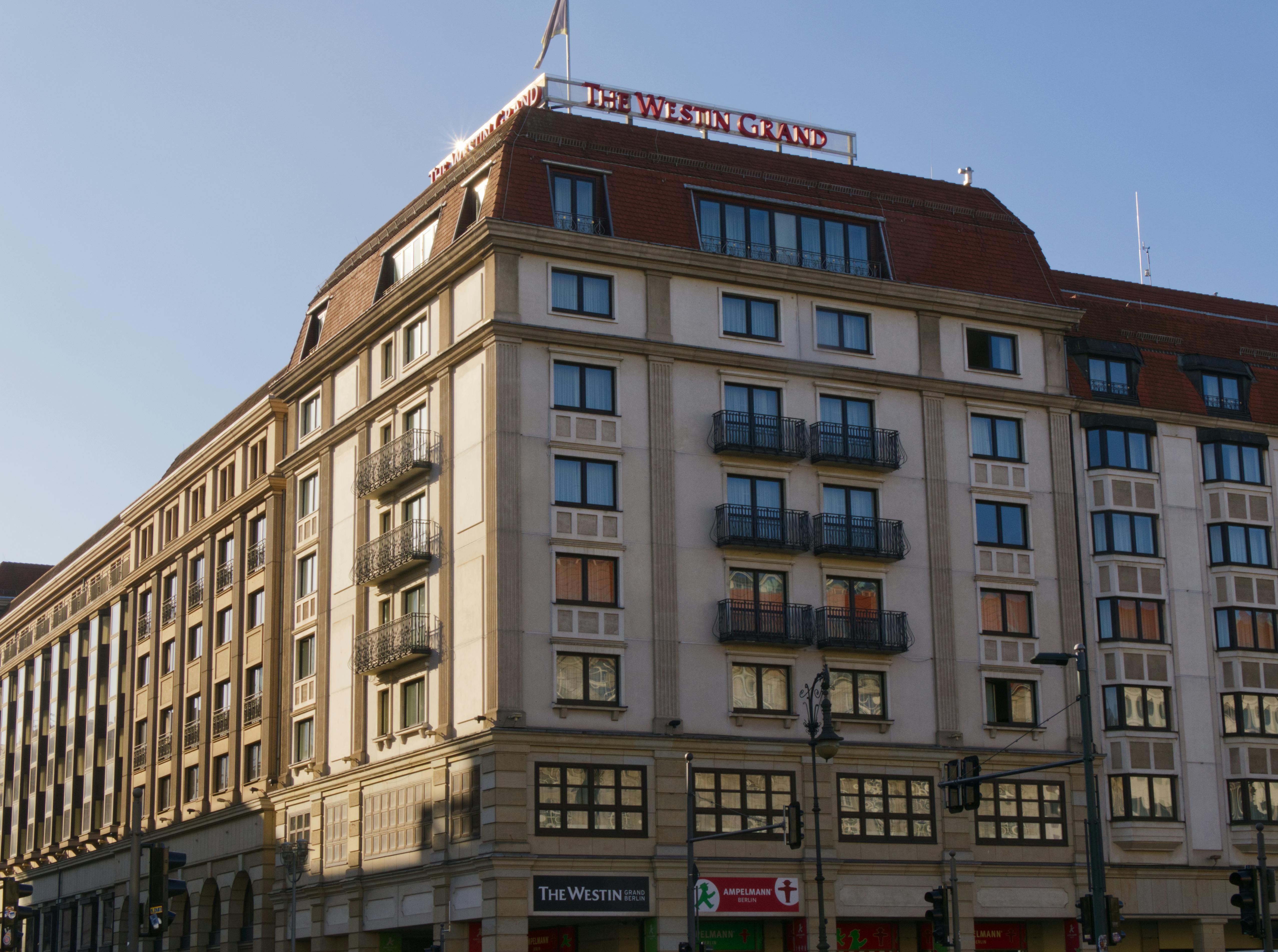 The Westin Grand Hotel facade with a modern architectural design under daylight.