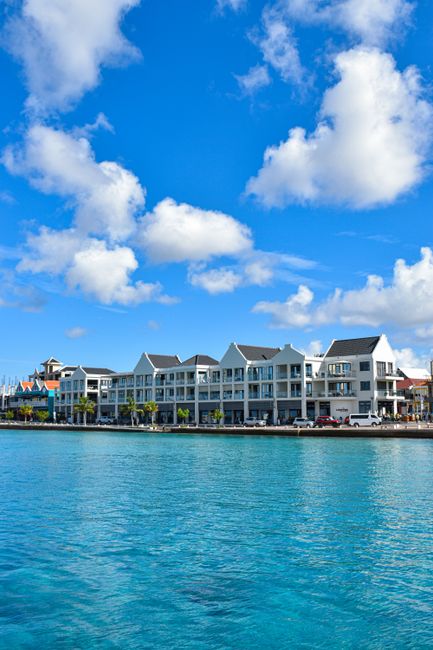 Kralendijk waterfront in Bonaire with colorful buildings and calm sea