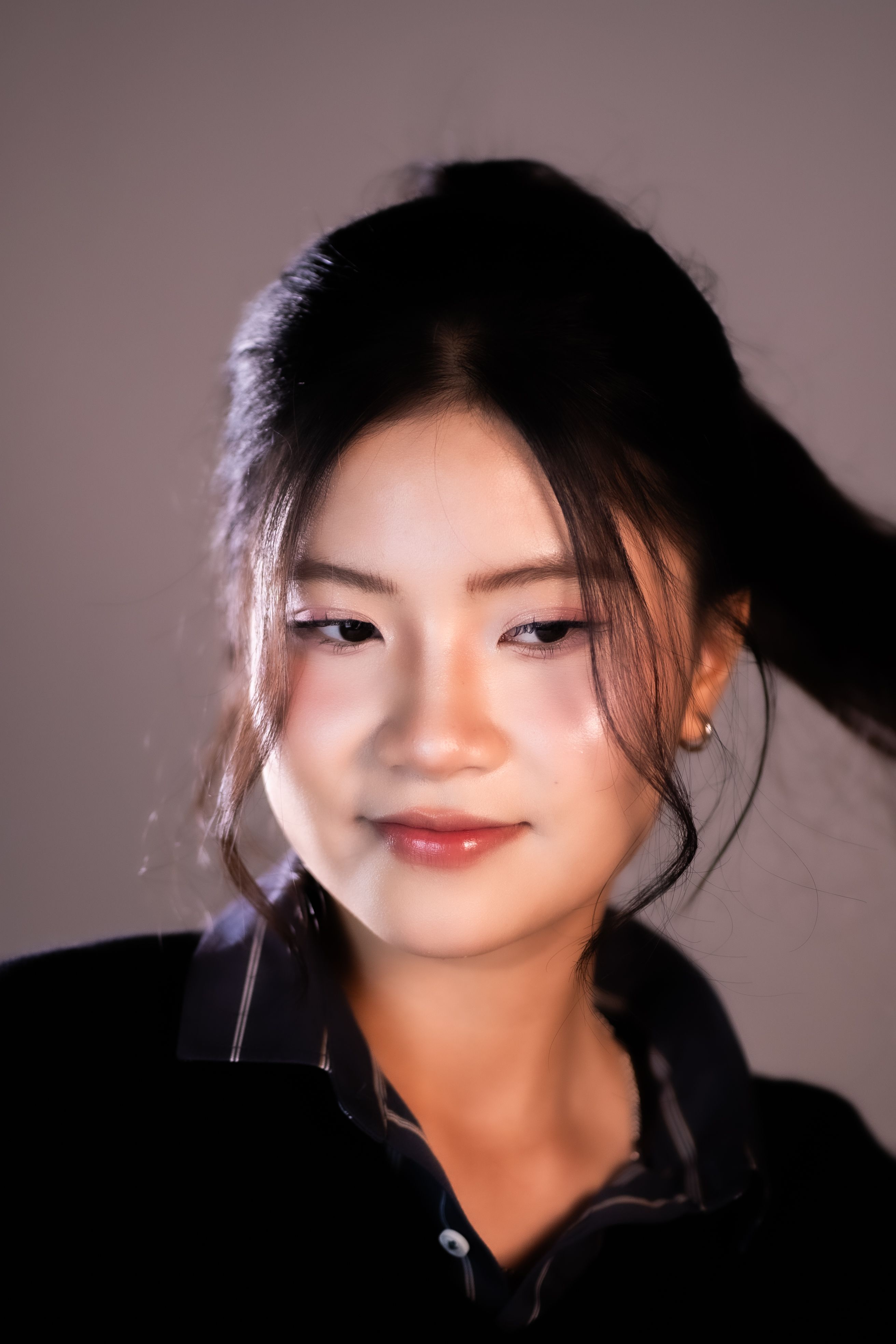 Portrait of a Young Woman with Soft Lighting · Free Stock Photo