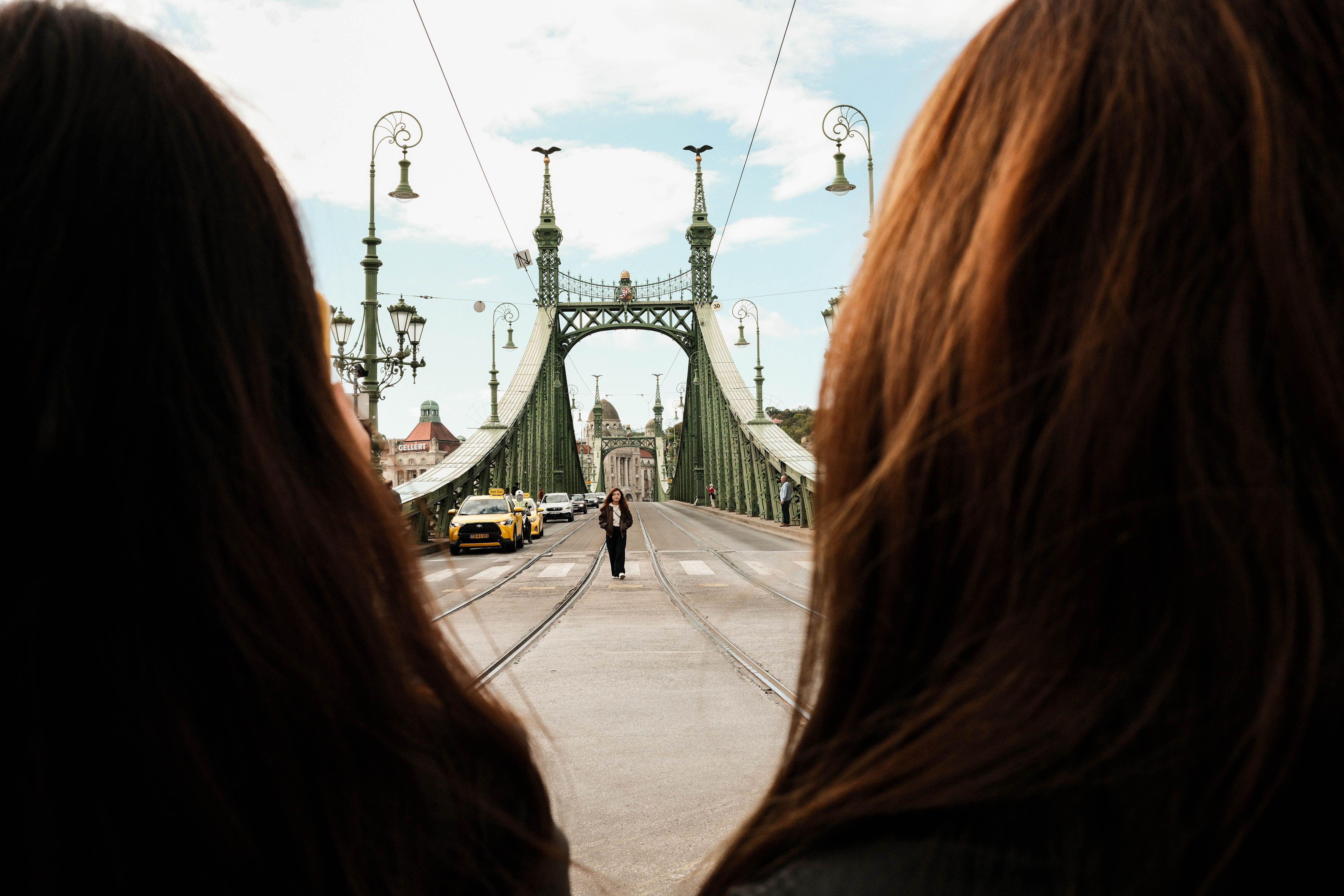 Traveler confidently navigating with a map in a bustling street of Budapest, Hungary