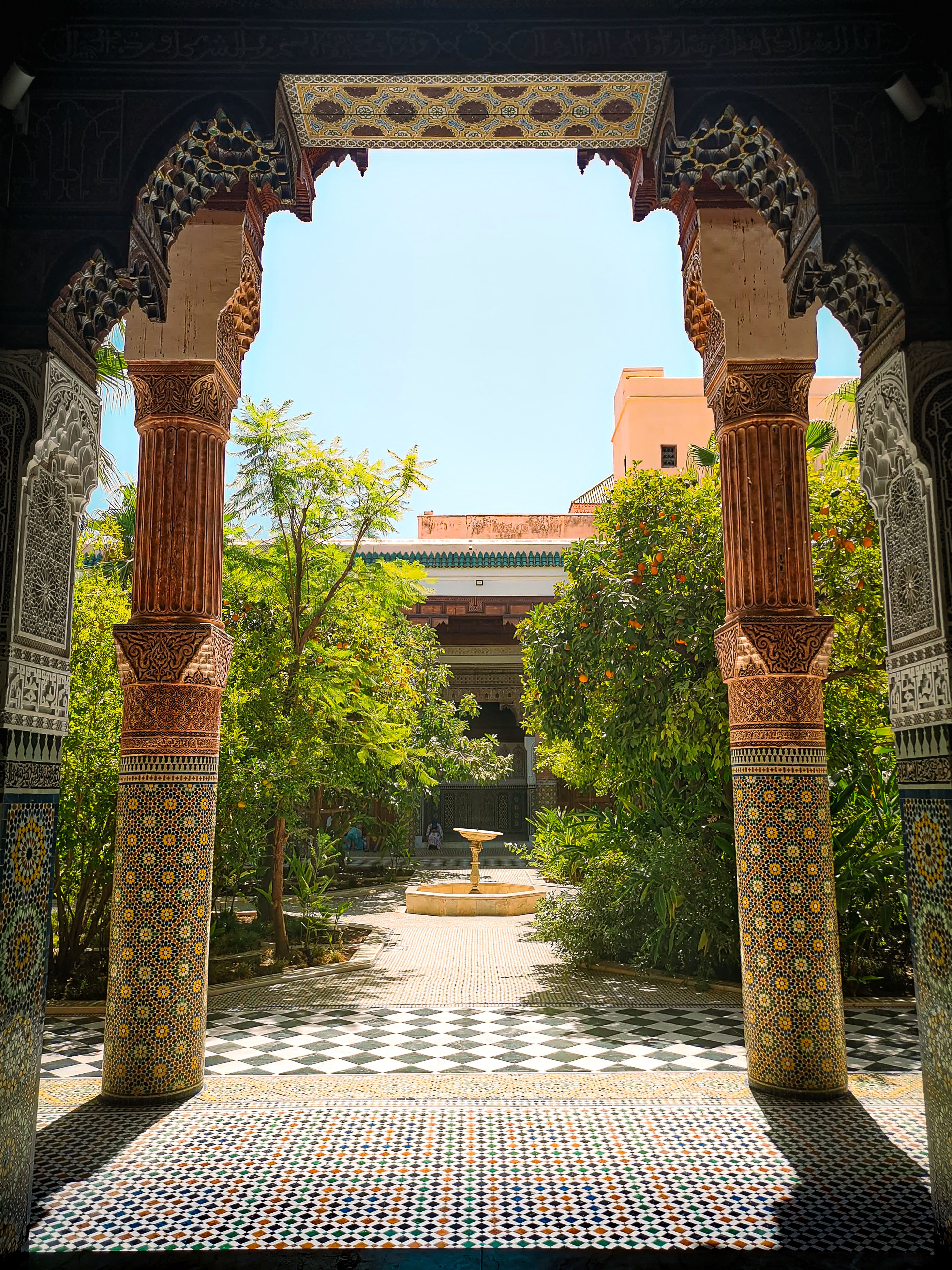 Decorative courtyard and greenery at Le Jardin Secret in Marrakech.
