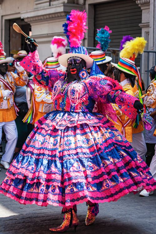 Free Colorful festival parade in Lima, Peru, featuring traditional costumes and dancers. Stock Photo
