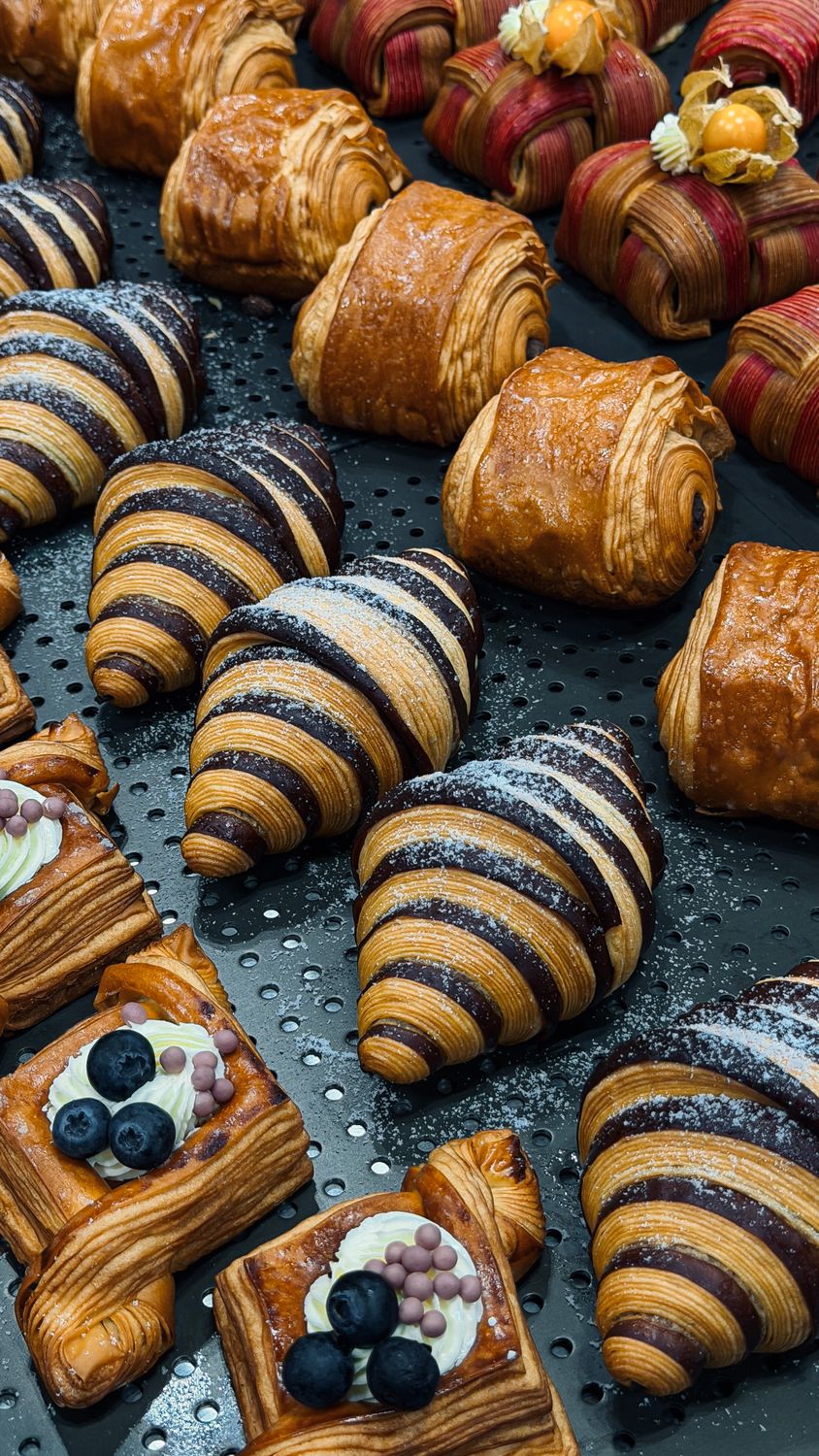 Assorted Pastries And Croissants In Bakery Display Free Stock Photo assorted-pastries-and-croissants-in-bakery-display-free-stock-photo