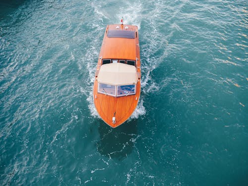 Free Brown Yacht on Body of Water Stock Photo