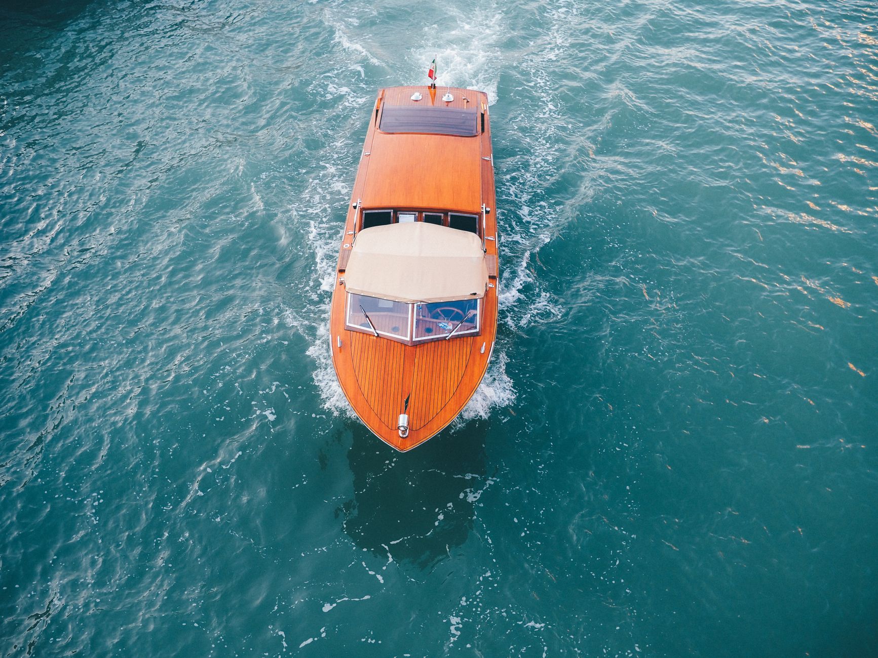 Brown Yacht on Body of Water