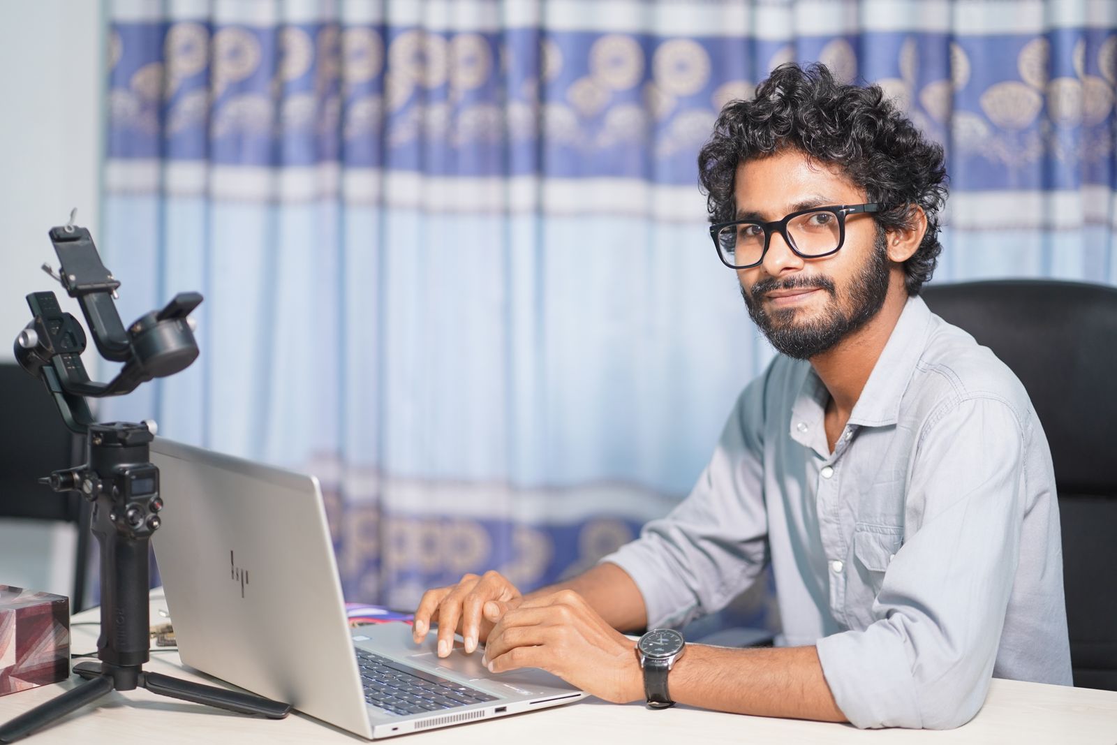 Website designer and developer working at a laptop