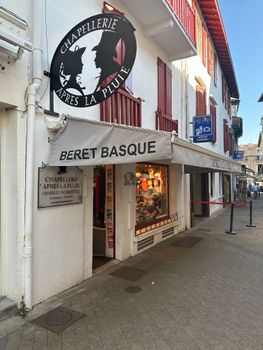 Explore the traditional Basque beret shop in the picturesque town of Saint-Jean-de-Luz.