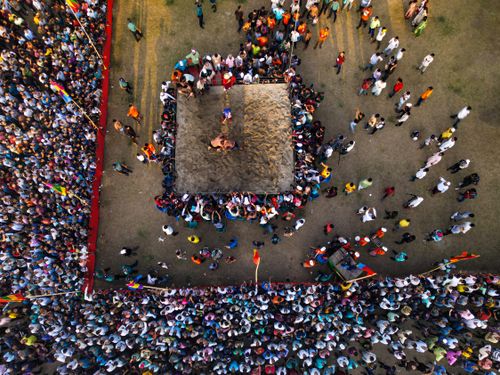 Free Aerial shot capturing a vibrant wrestling match with a crowd in Chattogram, Bangladesh. Stock Photo