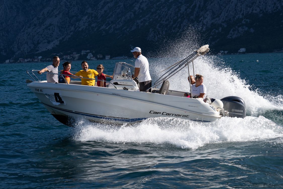 Speedboat Fun Family Enjoying a Speedboat Ride on Sunny Day · Free Stock Photo