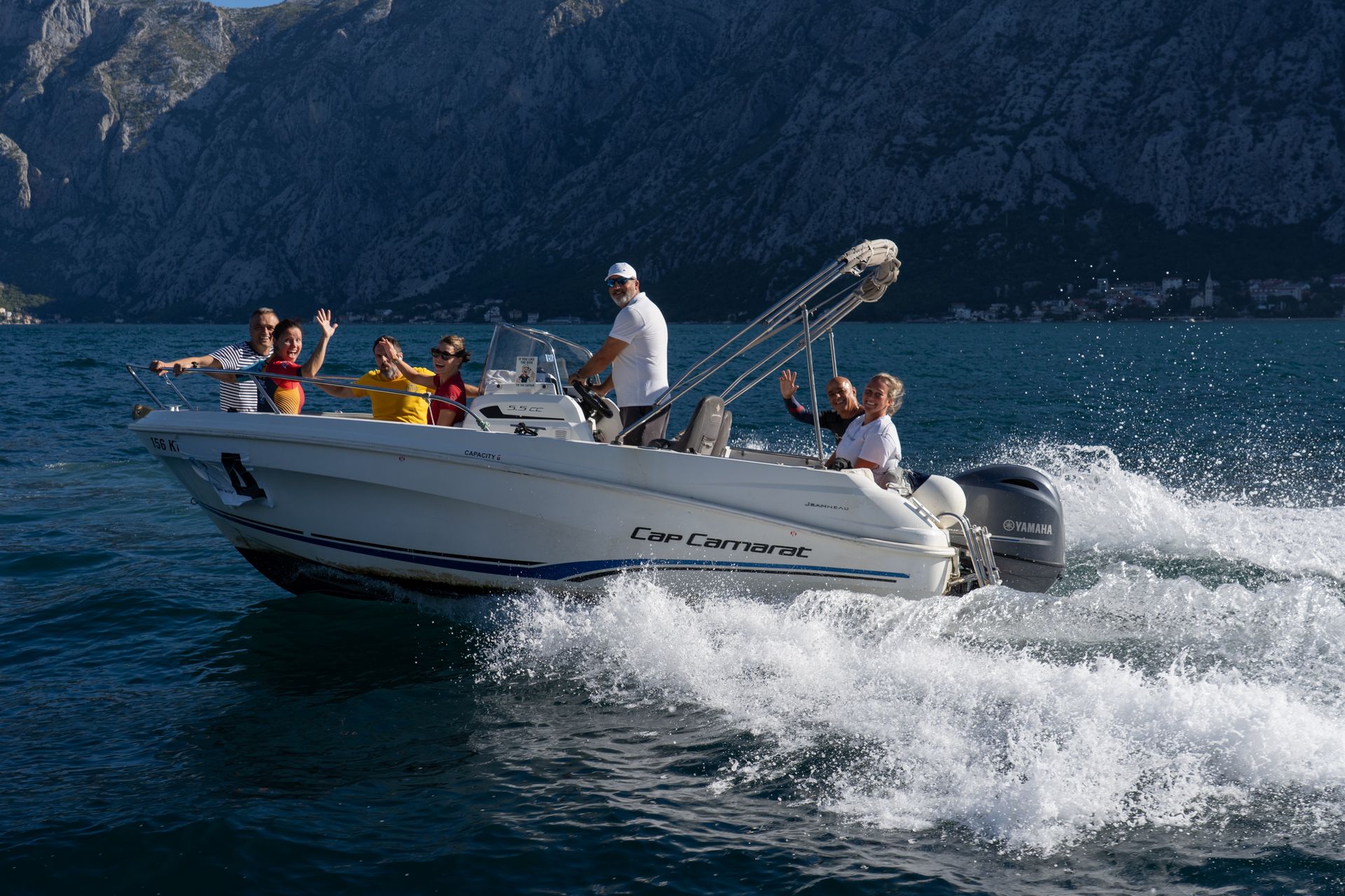 Guests enjoying a scenic boat ride together