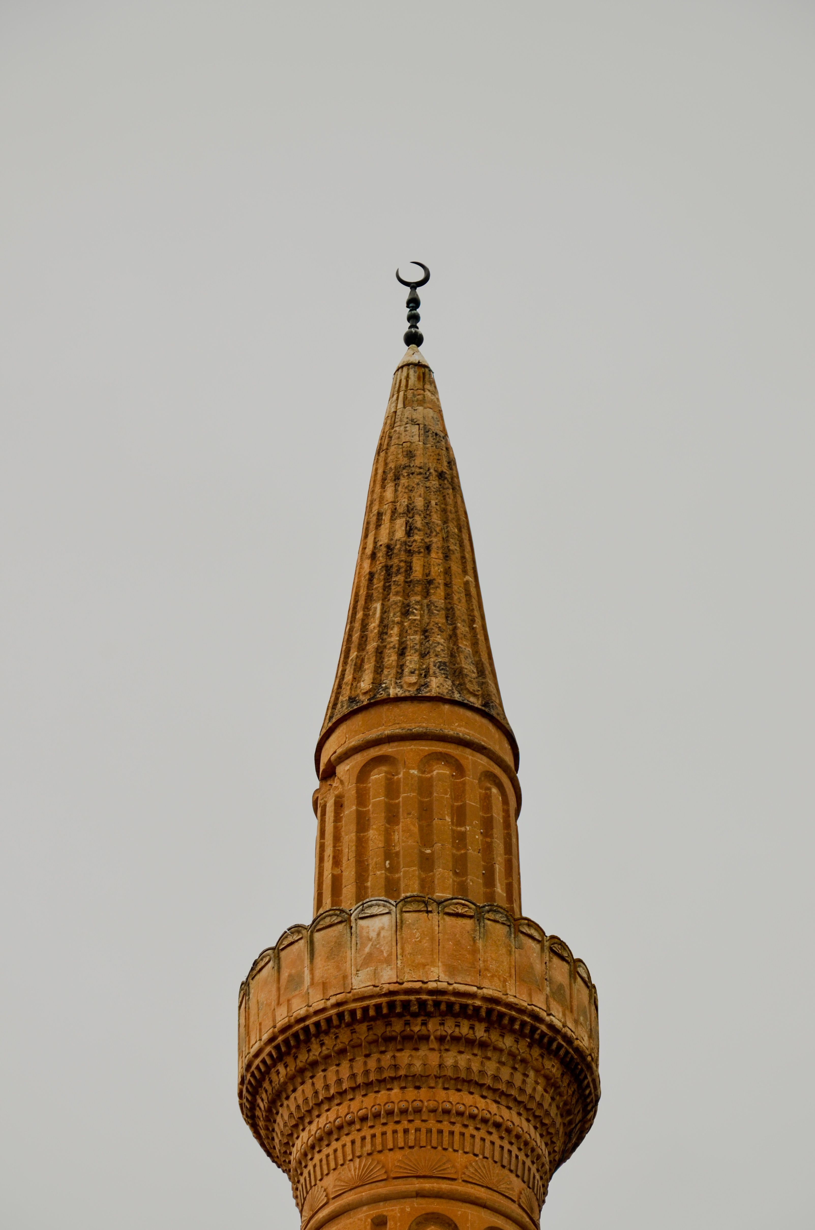 Historic Mosque Minaret with Crescent Spire · Free Stock Photo
