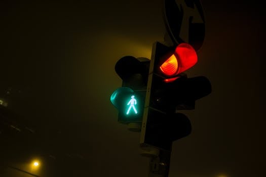 Red and green traffic lights at night in Bratislava, Slovensko.
