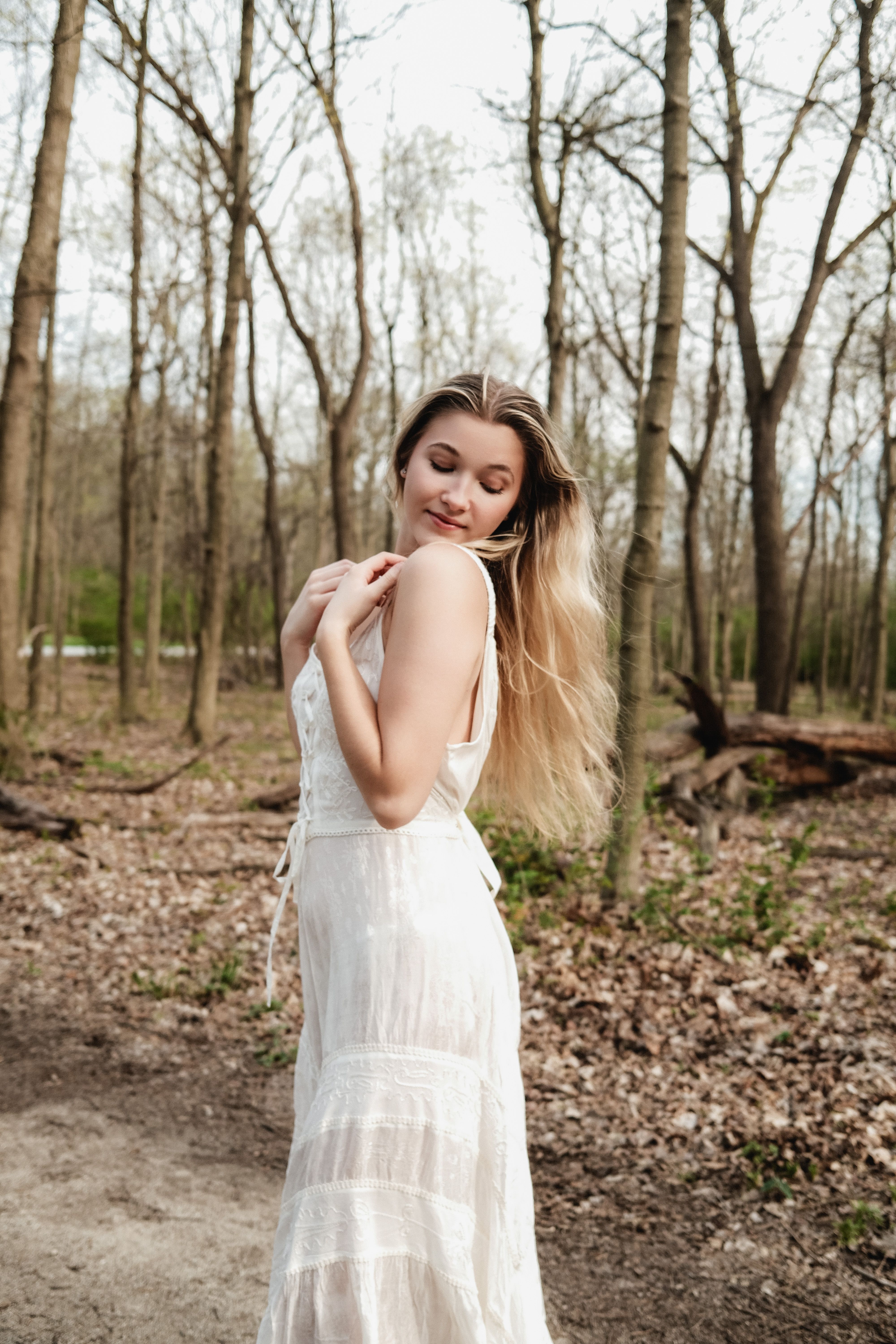 Woman in White Dress Posing in Forest Path · Free Stock Photo