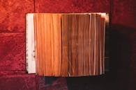 Book on Red Surface