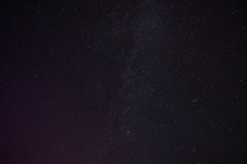 Free A mesmerizing view of a star-filled night sky taken in Stechlin, Brandenburg, Germany. Stock Photo