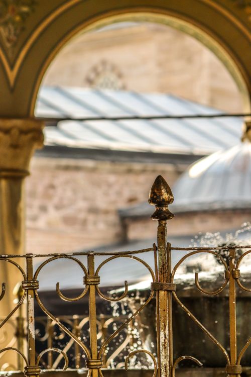 Free Close-up of ornate ironwork and arches at a historic site, showcasing intricate metal design. Stock Photo