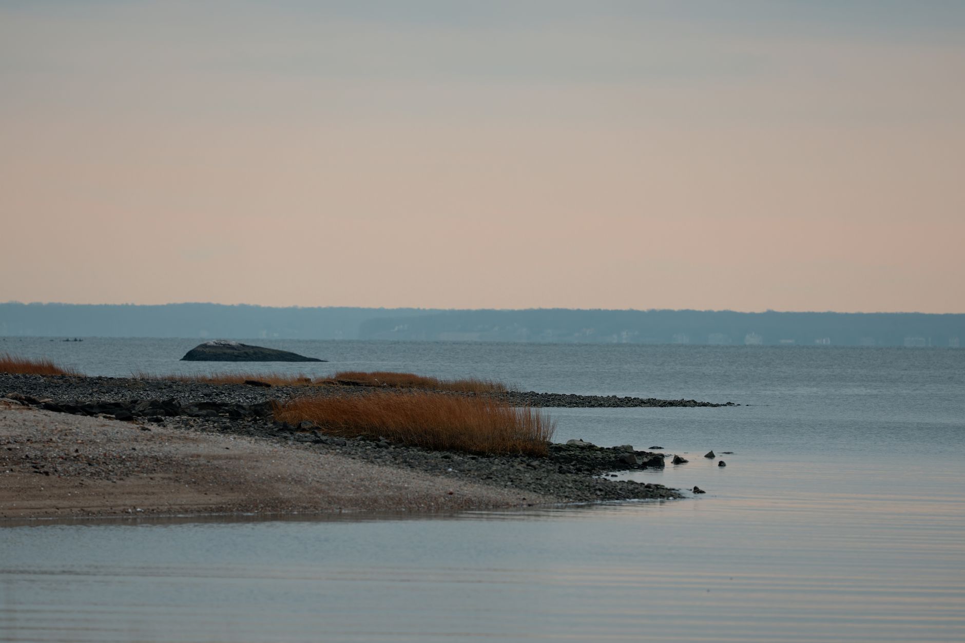 Serene view of a coastal landscape at twilight in Stamford, Connecticut.