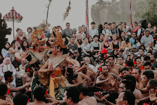Vibrant traditional dance performance at a cultural festival with a diverse audience.