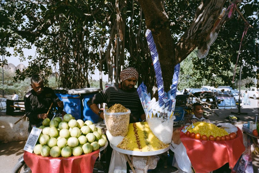 Vibrant street food market in Jaipur showcasing local vendors and fresh produce.