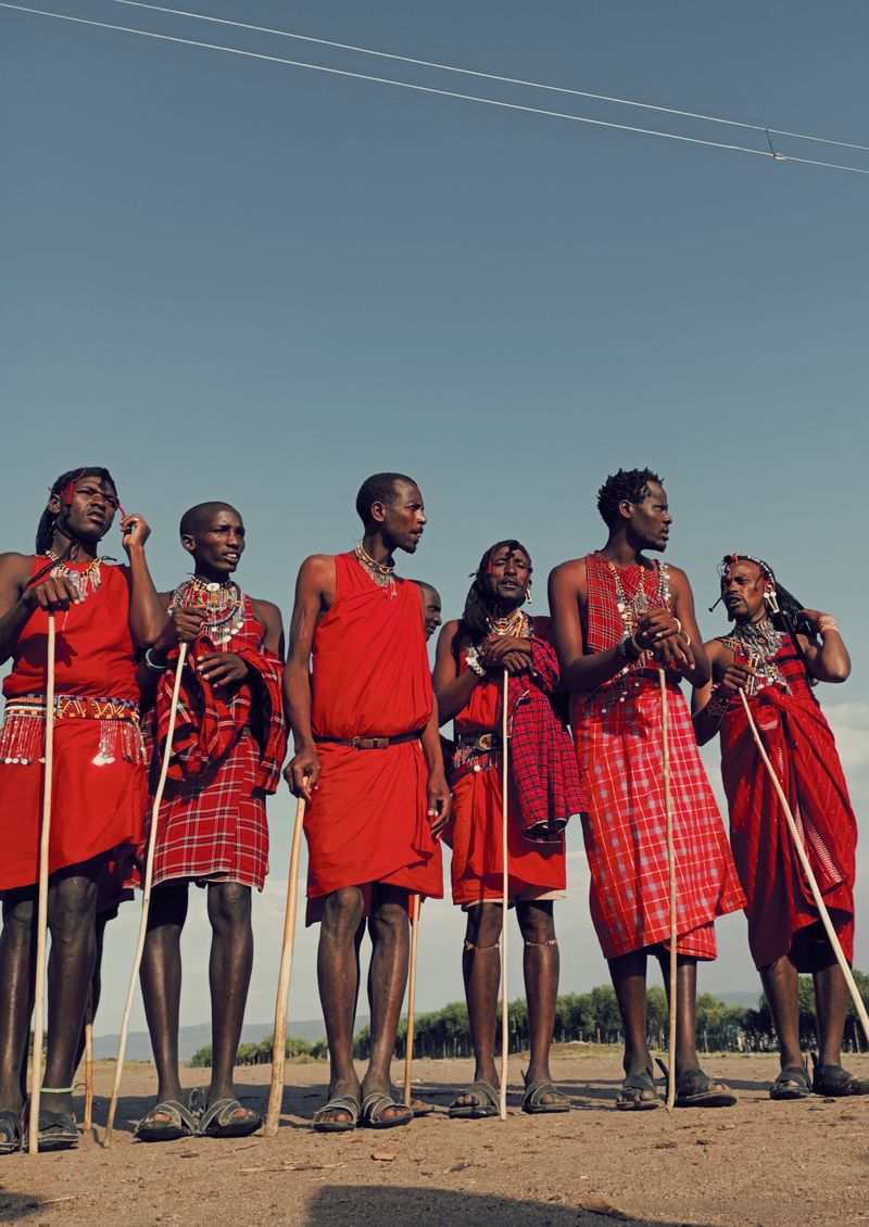 Maasai warriors in traditional dress on the savanna