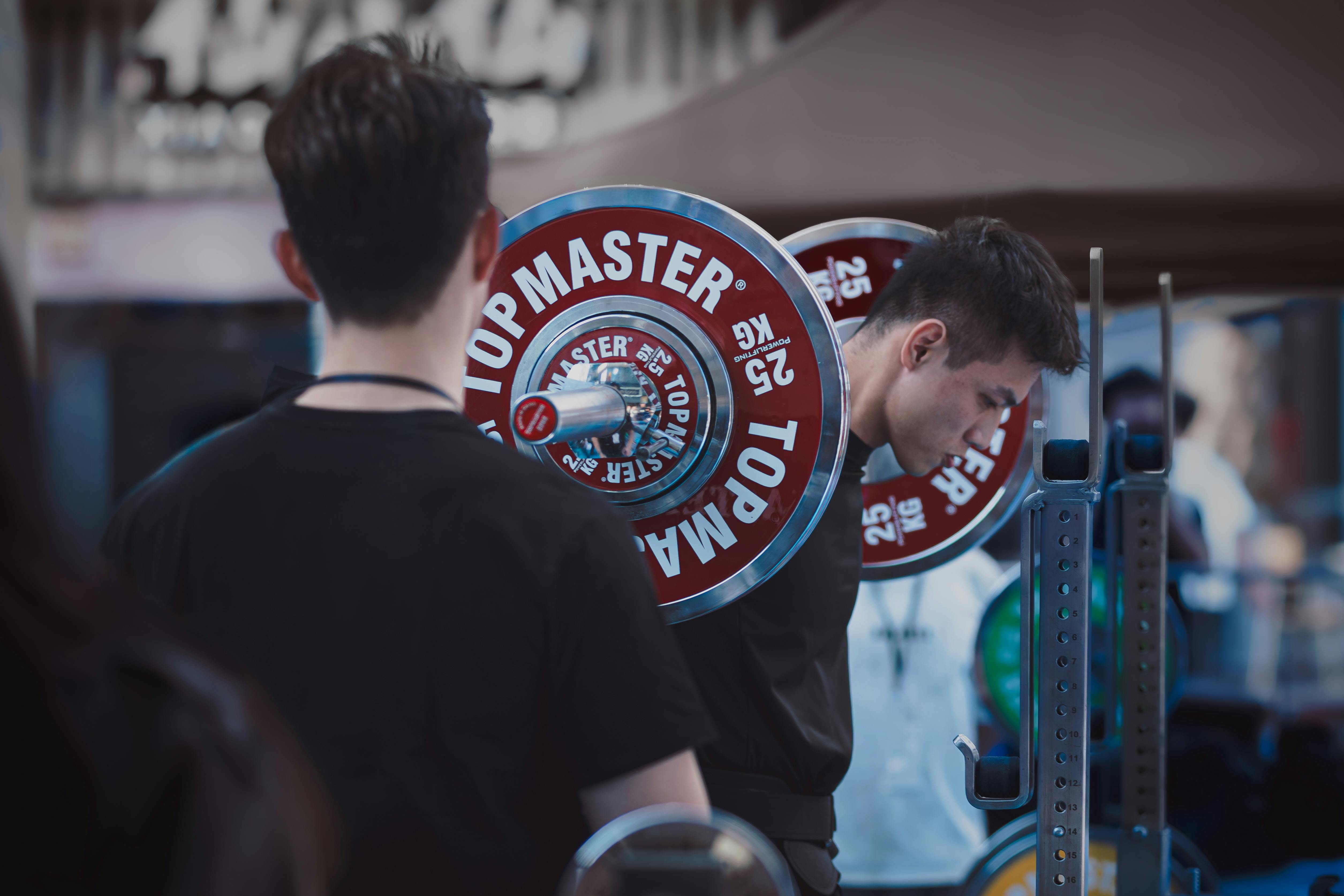 Free stock photo of athletic competition, lifting weights, public