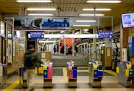 Japanese Train Station with Ticket Gates at Night