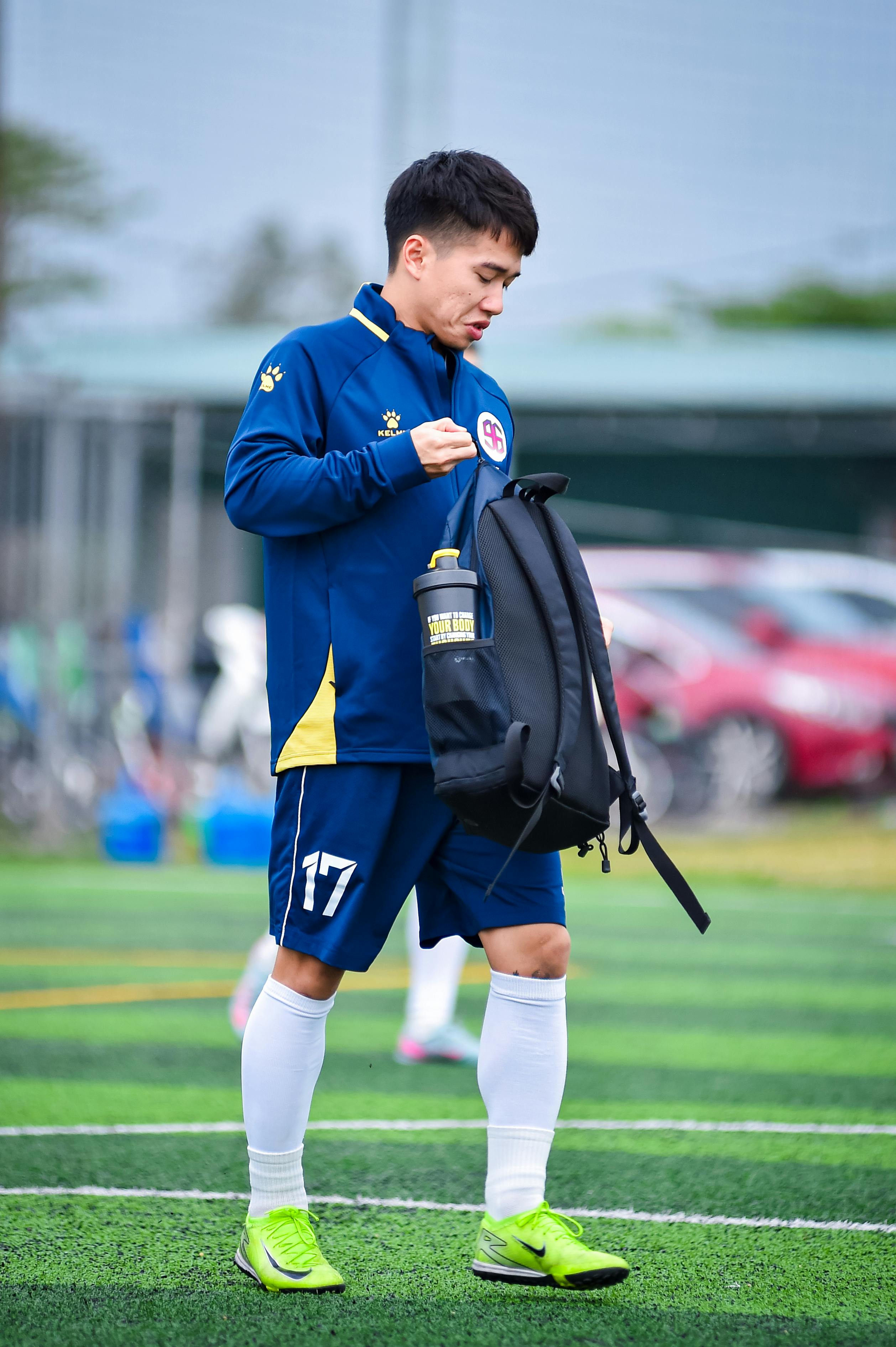 A football player prepares on a field in Hanoi, Vietnam.