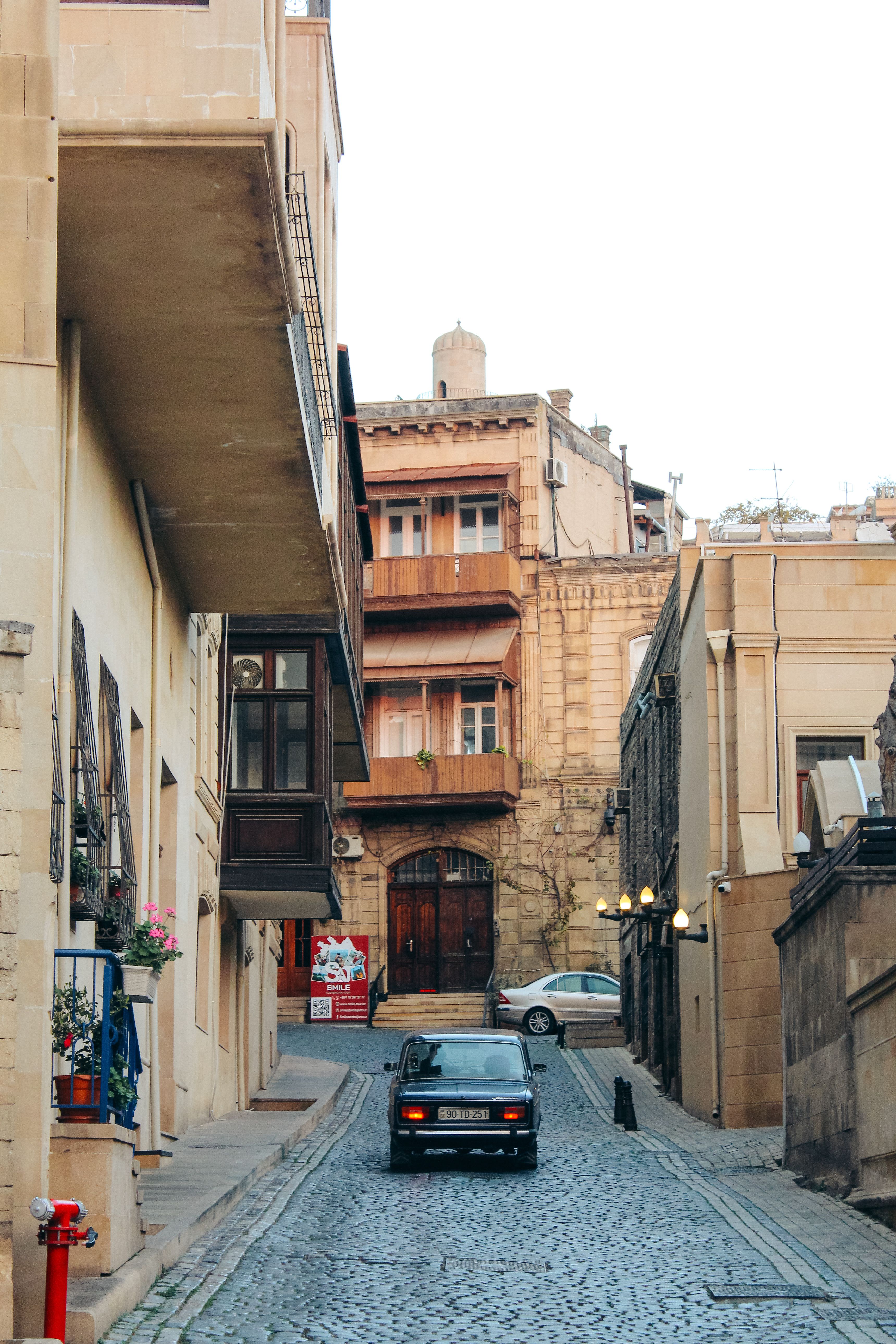Charming Cobblestone Street in Historic Cityscape · Free Stock Photo