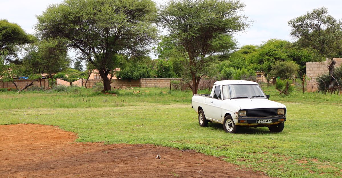 Car In Rural Setting Vintage Car in African Rural Landscape · Free Stock Photo
