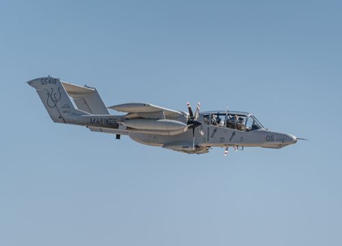 Free A USMC OV-10 Bronco aircraft flying during the Miramar Airshow, showcasing military aviation. Stock Photo
