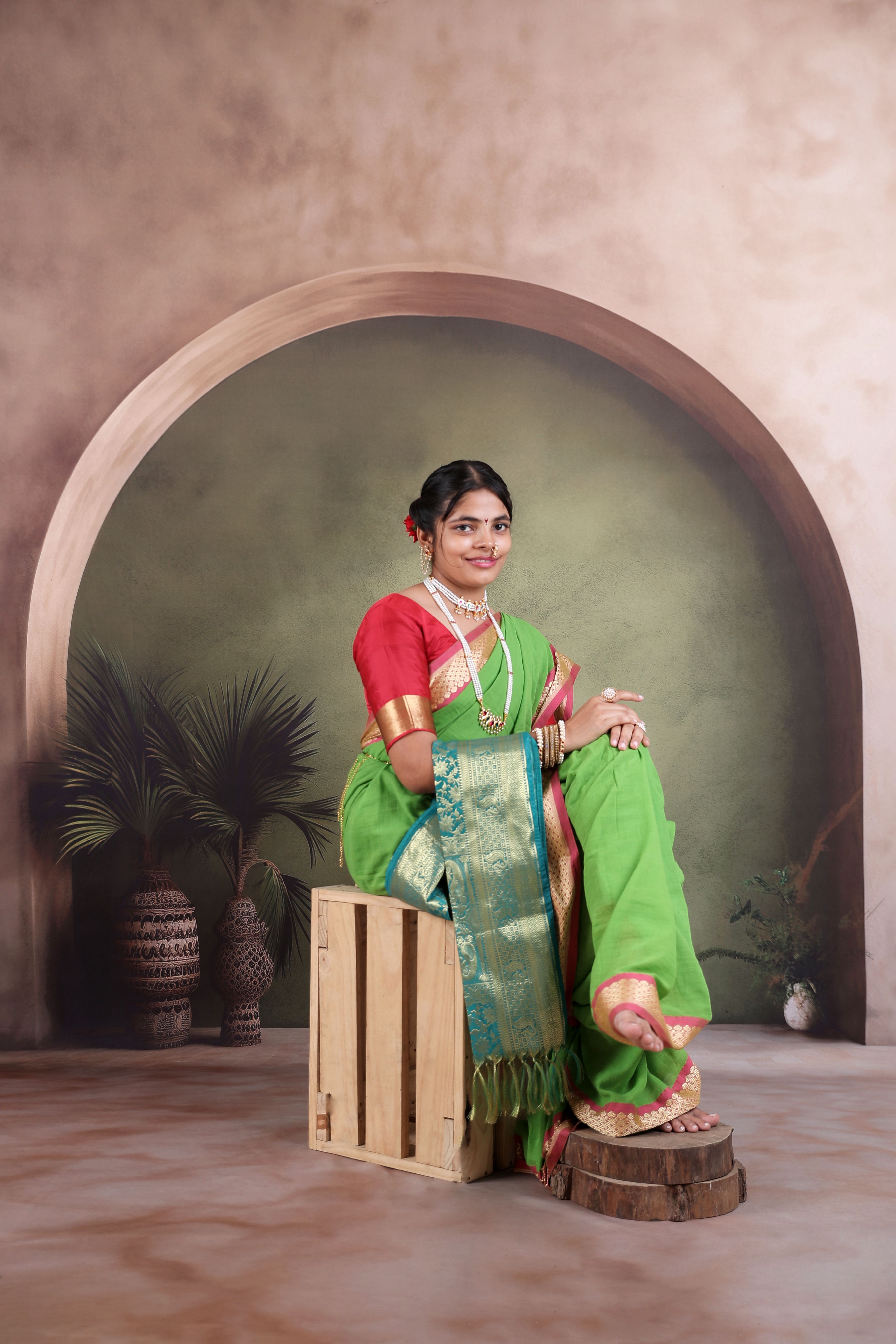 Elegant Portrait of Woman in Traditional Green Saree · Free Stock Photo