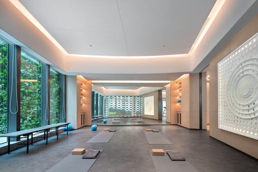 Spacious yoga studio with modern design and abundant natural light.