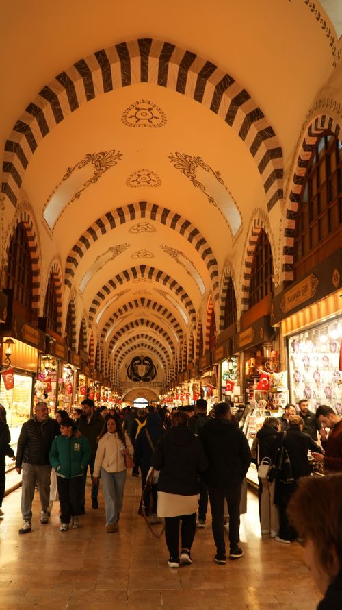 Free Crowds explore the vibrant and historic Grand Bazaar in Istanbul, showcasing stunning architecture. Stock Photo