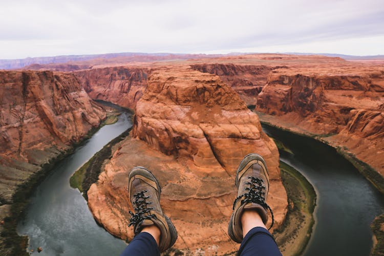 Person Wearing Pair Of Brown Hiking Shoes