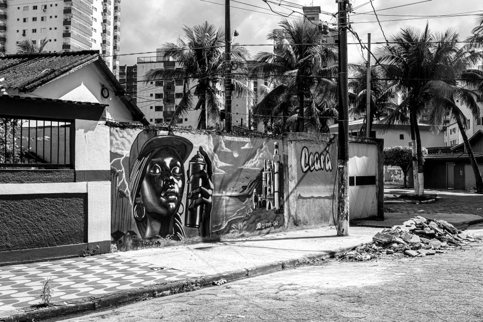 Vibrant colorful street art mural painted on urban wall in Rio neighborhood