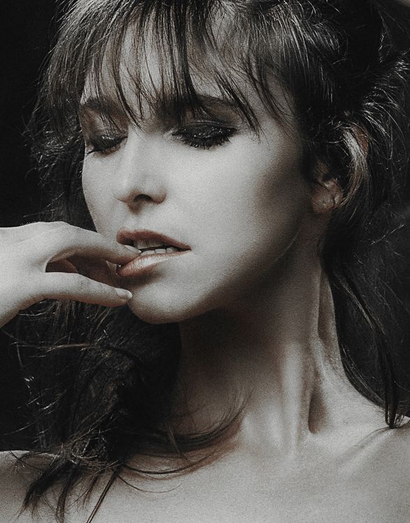 Elegant Portrait of Woman with Dramatic Lighting · Free Stock Photo