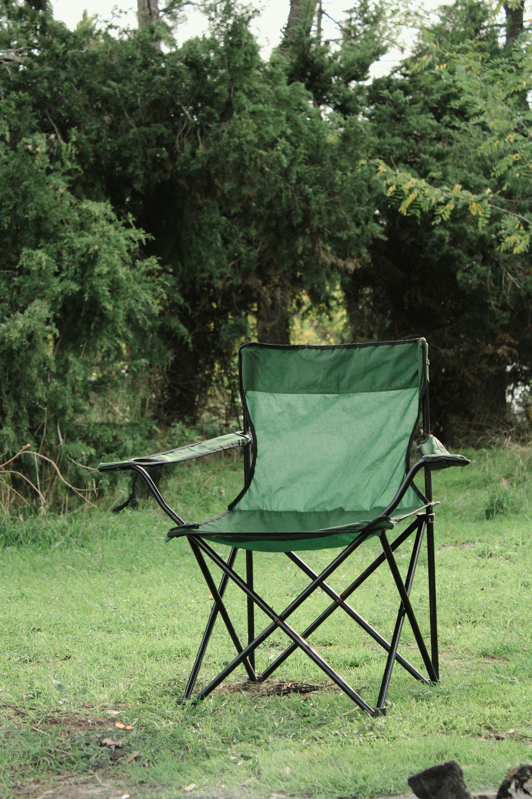 A single folding chair in the open, which is really the point: shape and height matter more than brand stickers.
