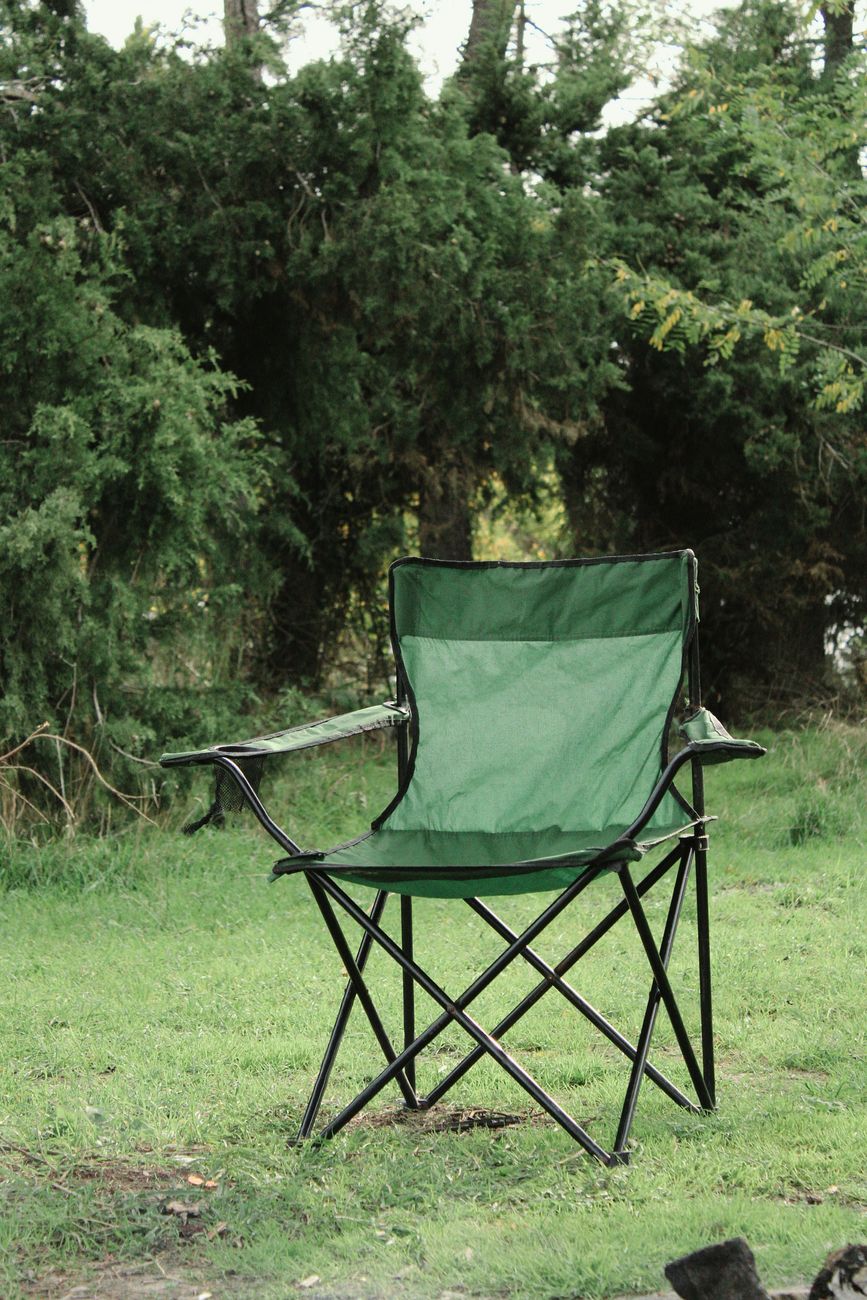 A single folding chair in the open, which is really the point: shape and height matter more than brand stickers.