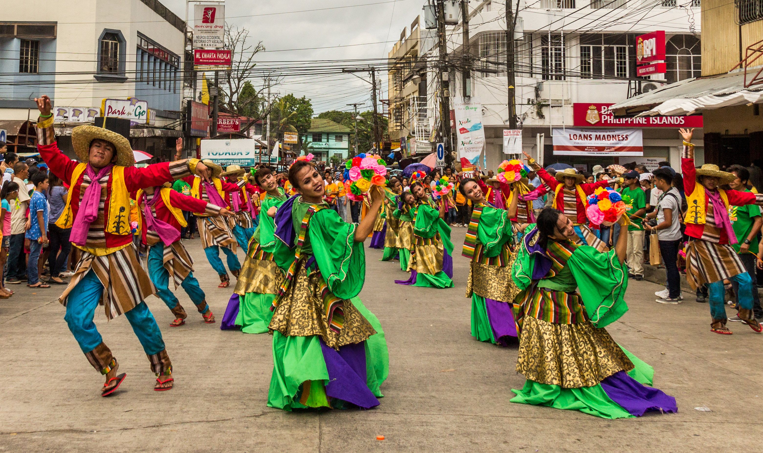 Vibrant Street Parade with Colorful Costumes · Free Stock Photo