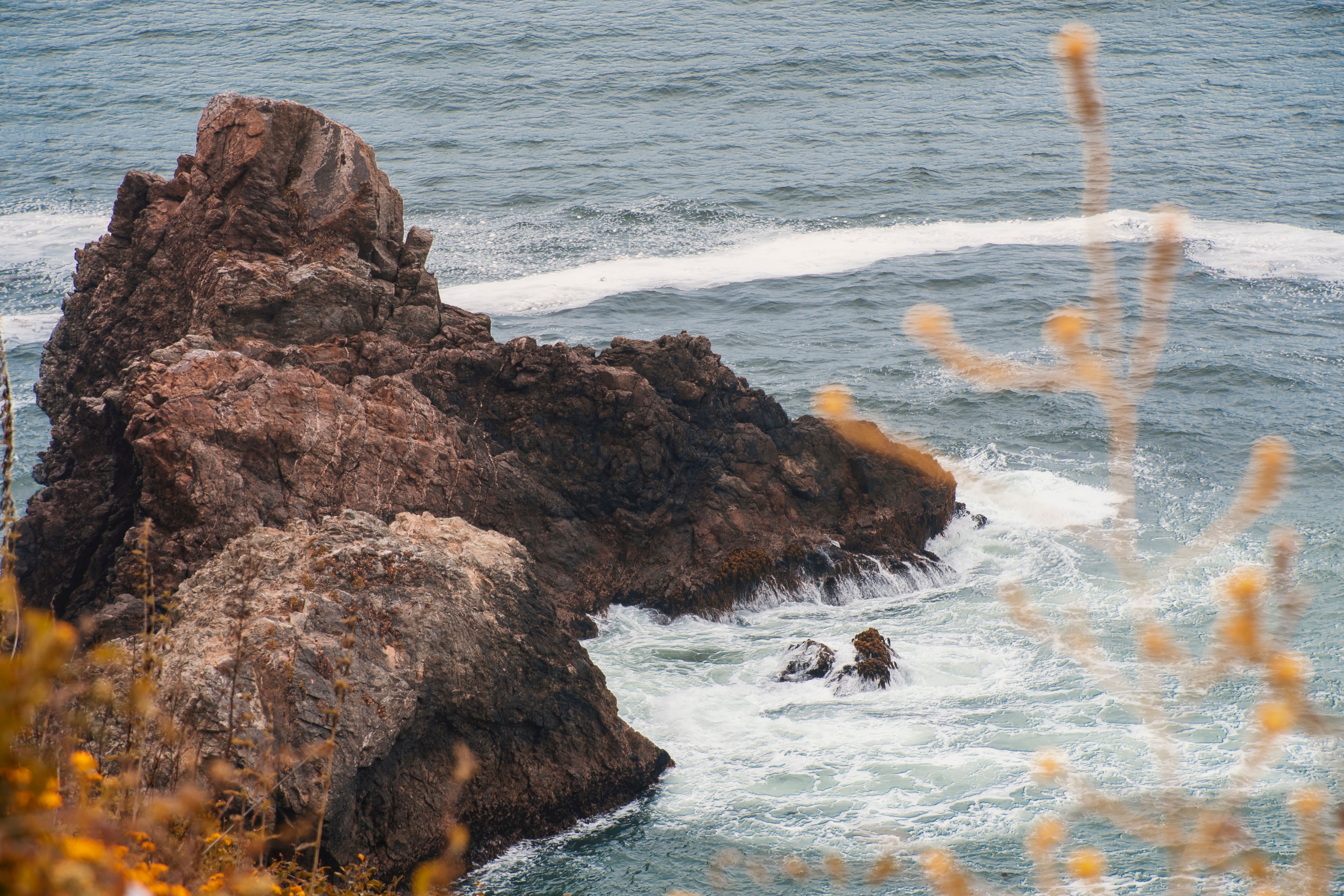 Dramatic Coastal Rock Formation in Ocean View · Free Stock Photo