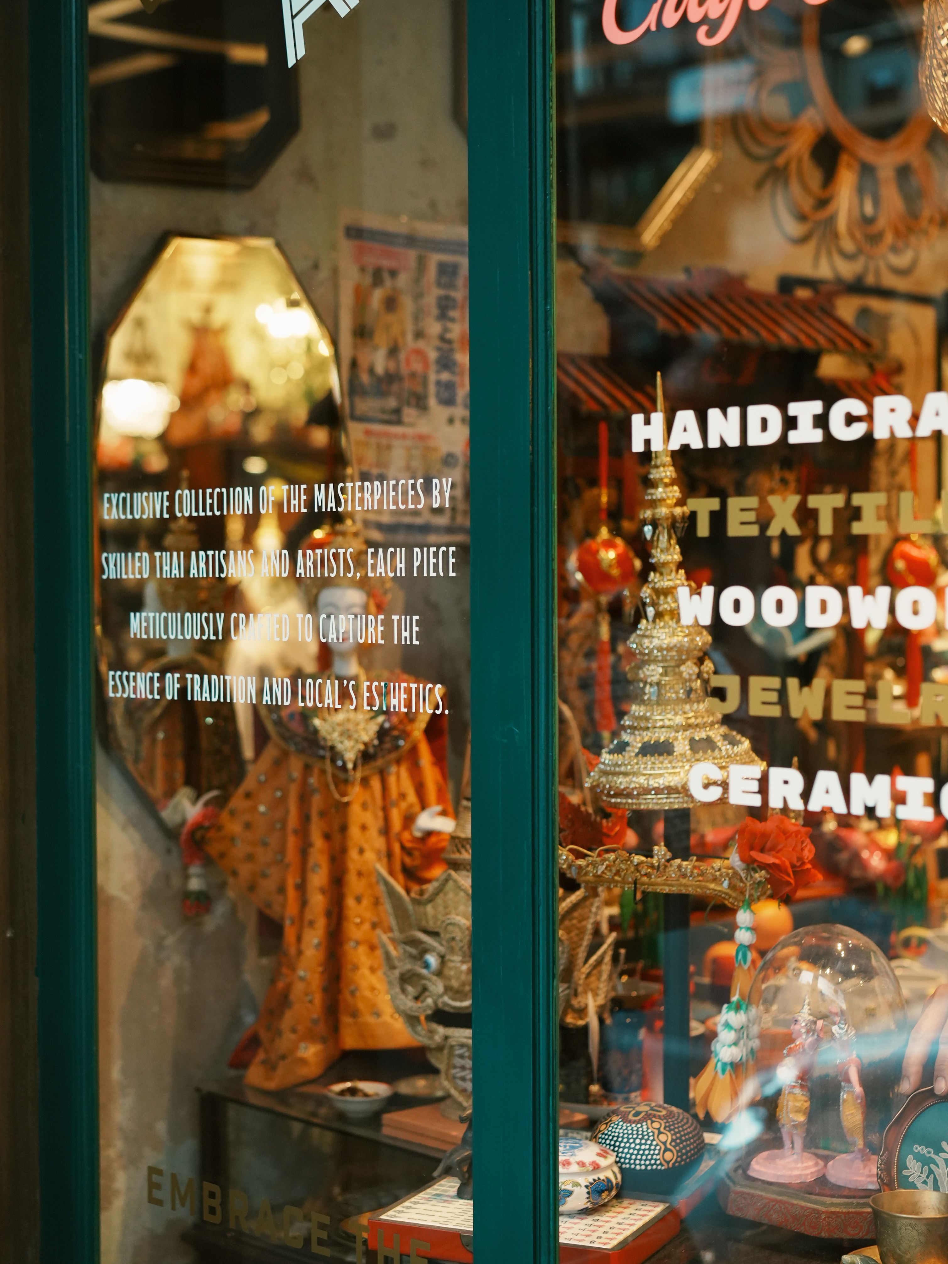 Charming Shop Window with Cat Plush Display · Free Stock Photo