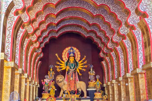 Free Intricate and colorful Durga Puja setup showcasing the vibrant cultural heritage and artistic craftsmanship. Stock Photo